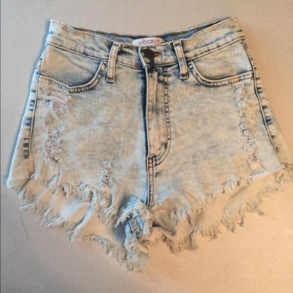 High waisted light wash shorts with tiger back